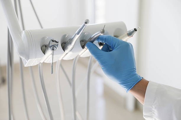 Professional Tooth Extraction technician working in Plainfield, IL